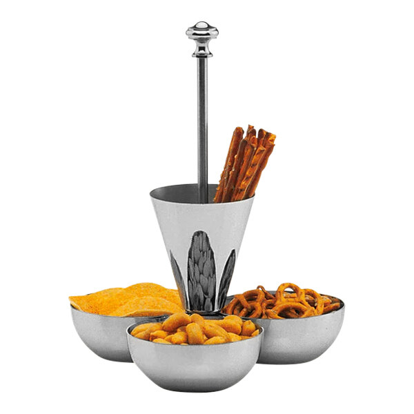 A Hepp stainless steel 4-compartment snack stand filled with pretzels and crackers on a counter.
