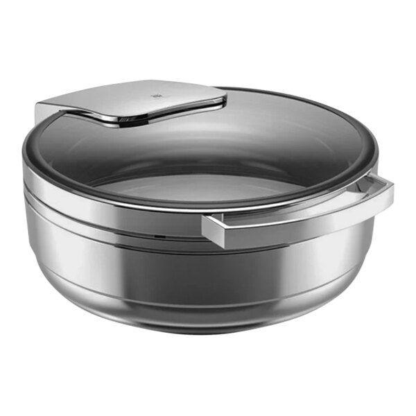 A silver stainless steel WMF chafing dish with a lid.