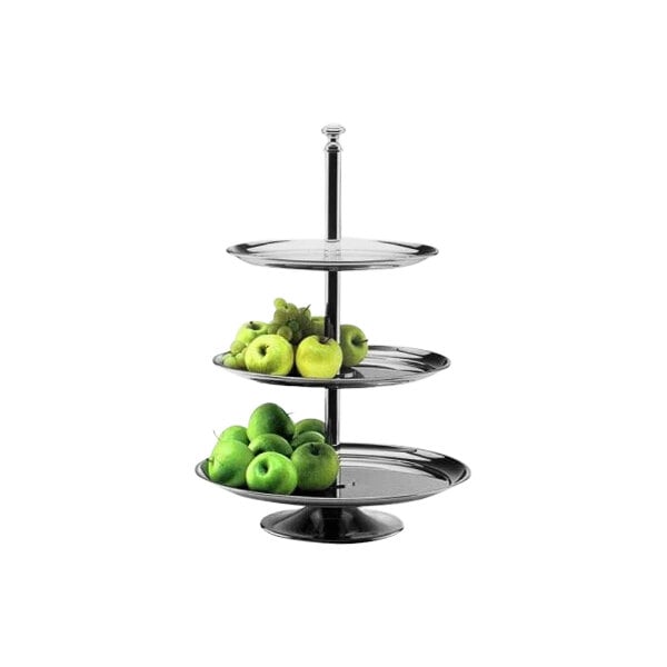 A Hepp by BauscherHepp 3-tiered stainless steel display stand with green apples.