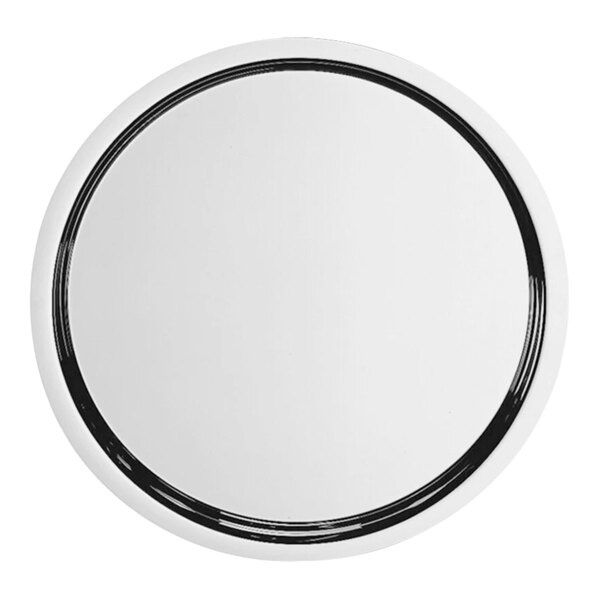 A round stainless steel serving tray.