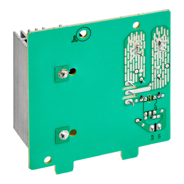A green Solwave PCB assembly board with silver metal parts.