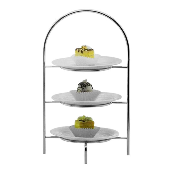 A Hepp by BauscherHepp silver plated stainless steel three tiered display stand with desserts on it.
