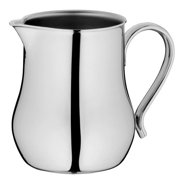 A WMF by BauscherHepp stainless steel creamer with a handle.