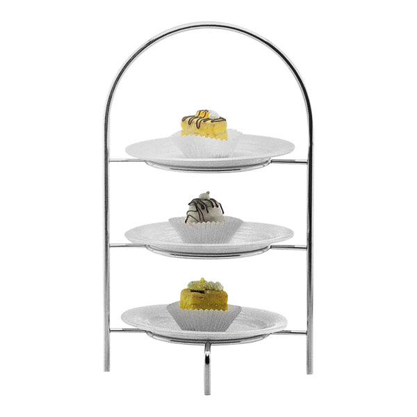 A Hepp by BauscherHepp stainless steel three tier multi-purpose display stand with desserts on it.