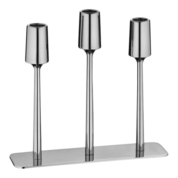 A silver metal WMF Urban 3-tier candle holder with three candles.