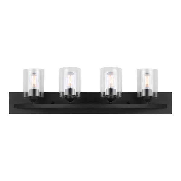 A Canarm Hampton matte black vanity light with clear glass shades over three light bulbs.
