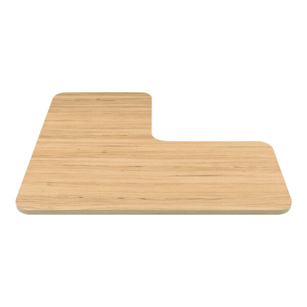 A WMF melamine wood grain L-shaped plate on a wood surface.