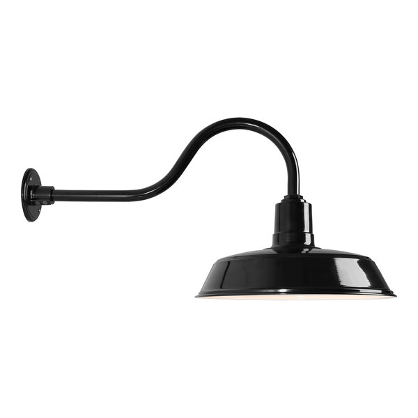 A black Canarm outdoor sign light with curved arm and white shade.