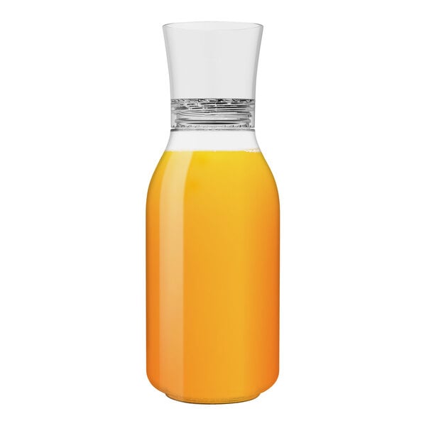 A Tossware plastic carafe filled with orange juice.