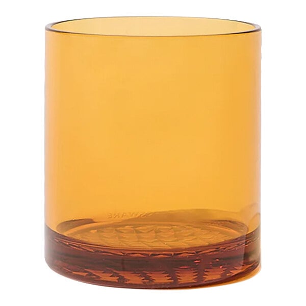 A Tossware plastic rocks glass with a brown rim.