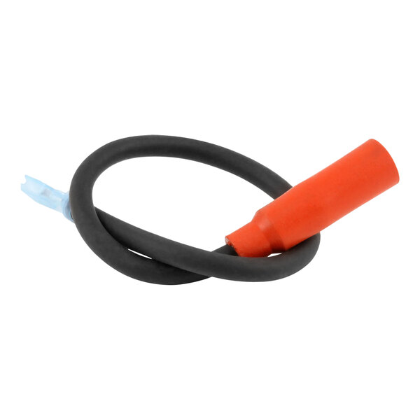 An AccuTemp ignition cable with a black and orange cable and a red plug.