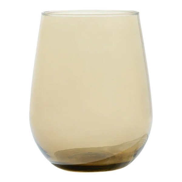 A Tossware Reserve Go-To stemless wine glass with a clear surface and brown rim.