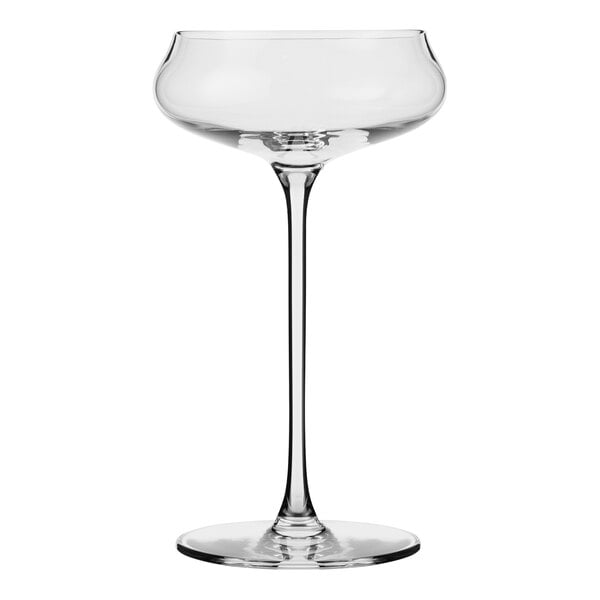 A clear coupe glass with a stem.