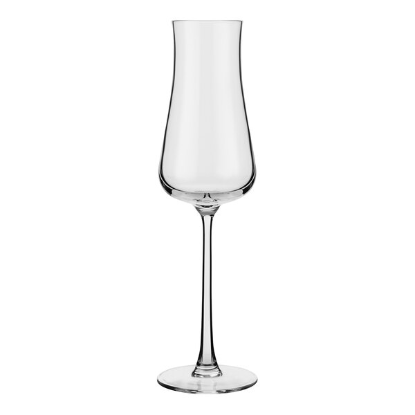 A clear wine glass with a long stem.