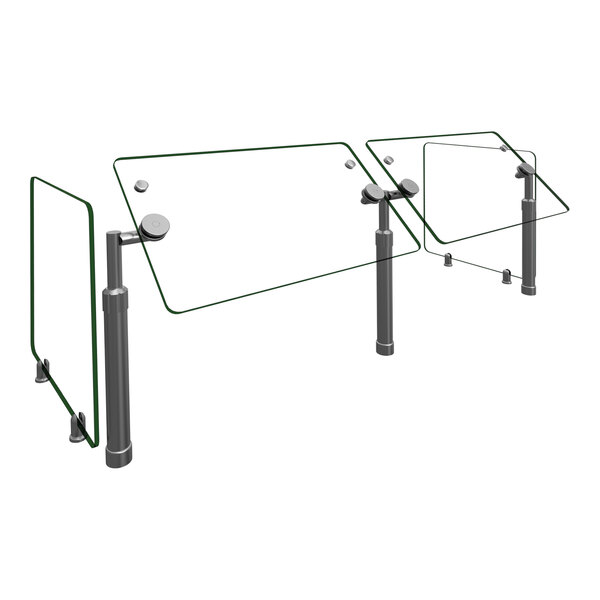 A Hatco custom sneeze guard on a glass table with metal legs.