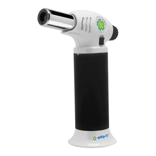 A Whip-It Ion black and white butane torch with a green handle.