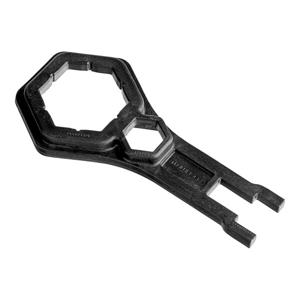 A black hexagonal Flushmate 3-in-1 wrench.
