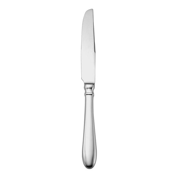 A silver Sant' Andrea Corelli steak knife with a white background.