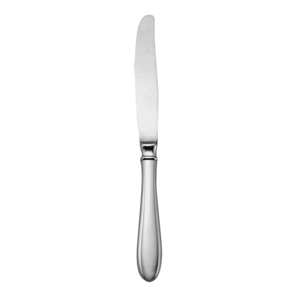 A silver Sant' Andrea Corelli dessert knife with a white handle.