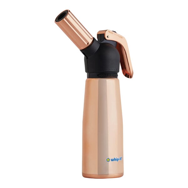 A black and copper Whip-It butane torch with a rose gold motif on the bottle.