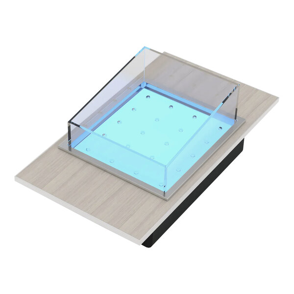 A clear glass box with a blue light on top containing a Bon Chef Nexus drop-in cold food well.