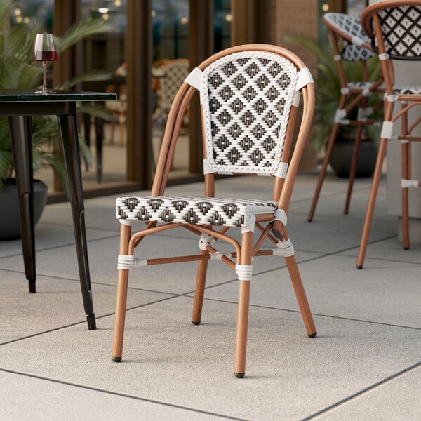 Lancaster Table & Seating Black and White Birdseye Weave Rattan Outdoor Side Chair