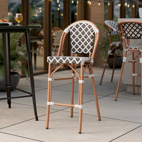 Lancaster Table & Seating Bistro Series Black and White Birdseye Weave Rattan Outdoor Side Barstool