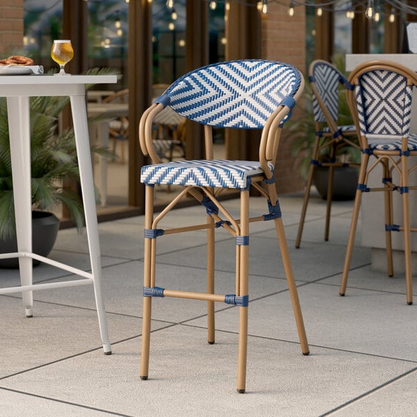 Lancaster Table & Seating Navy and White Chevron Weave Rattan Outdoor Arm Barstool