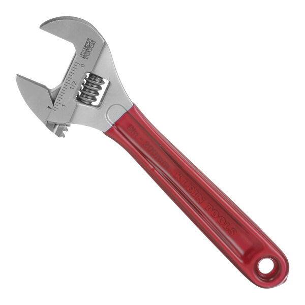 A close-up of a red and silver Klein Tools adjustable wrench with a red handle.