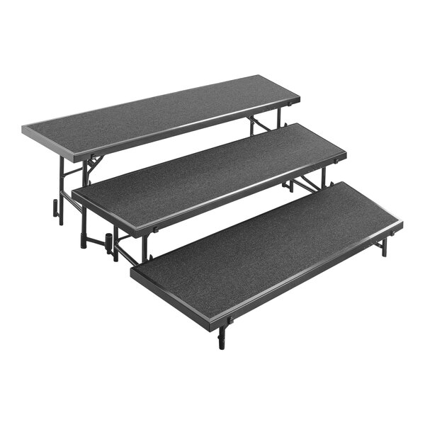 A black National Public Seating choral riser with three levels.