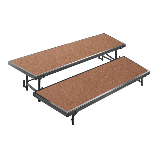 A National Public Seating hardboard choral riser with two levels and metal legs.