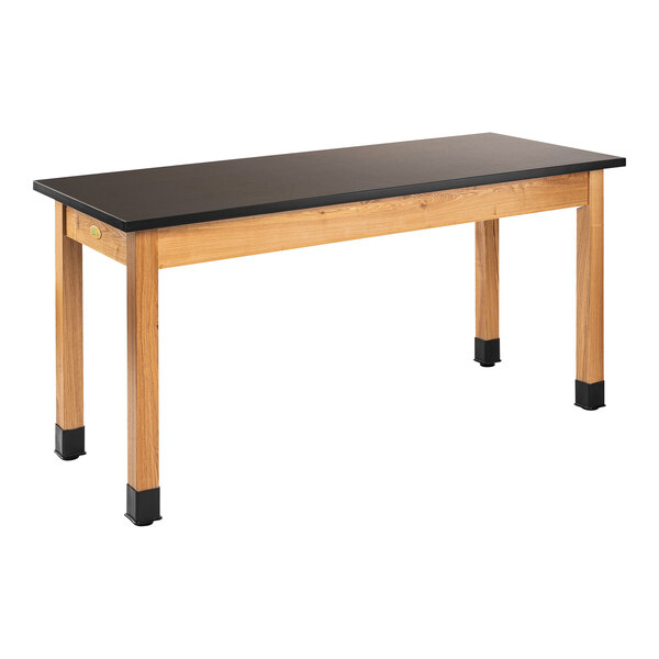 A black National Public Seating wood science lab table with wooden legs.