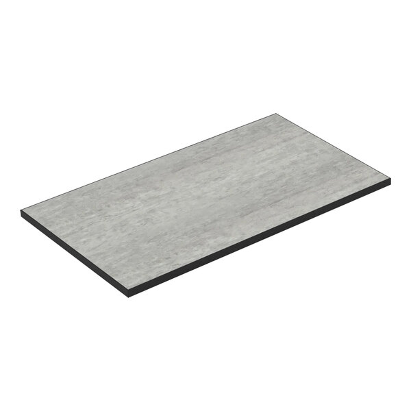 A grey rectangular Bon Chef countertop panel with black edges and a concrete laminate top.