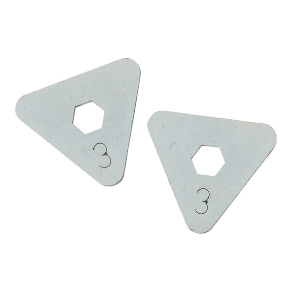 Two white metal triangular pieces with hexagon cutouts and the number 3.
