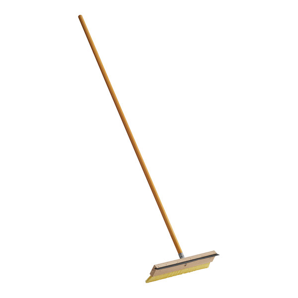A Midwest Rake protective coating brush with a wood handle.