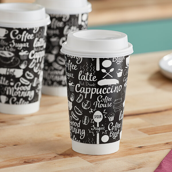 Three Choice Coffee Break paper hot cups with a black and white coffee design and white text on a table.