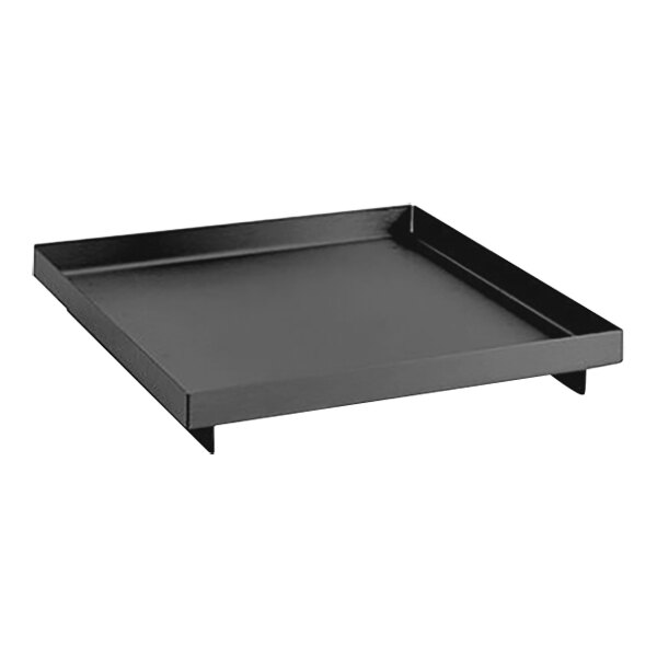 A black square Room360 amenity tray with brushed stainless steel legs.