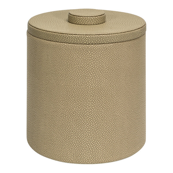 A round beige Room360 ice bucket with a lid.