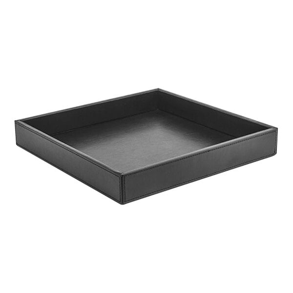 A black Room360 London faux leather square tray with a handle on a grey surface.