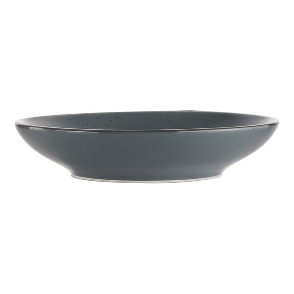 A grey stoneware bowl with specks and a black rim.