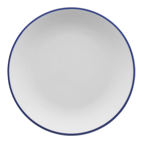 A white porcelain bread and butter plate with a blue rim.