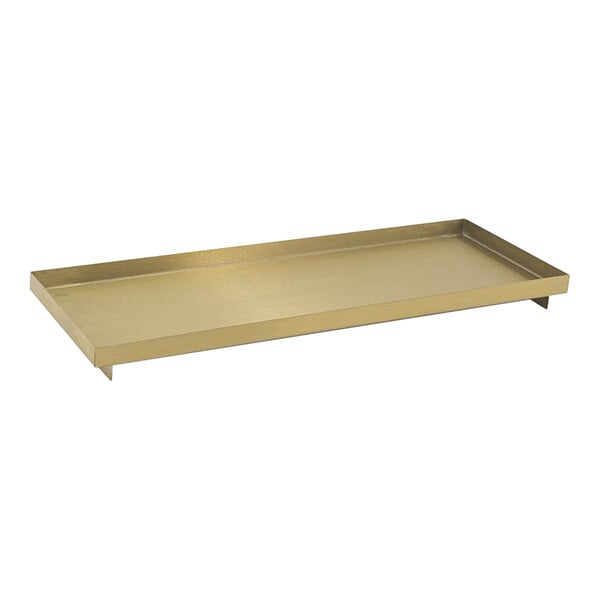 A rectangular matte brass and brushed stainless steel Room360 amenity tray with metal handles.