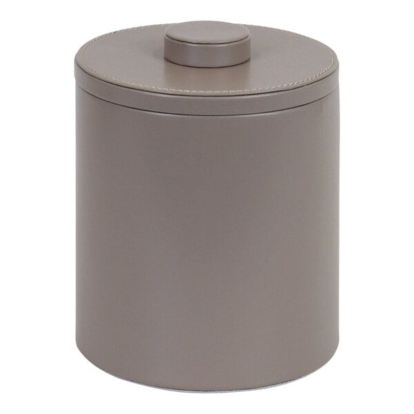 A round grey faux leather ice bucket with a stone lid.
