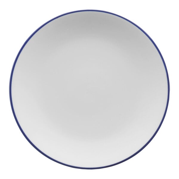 A white porcelain coupe plate with a blue band.