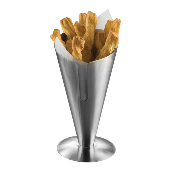 An American Metalcraft stainless steel conical french fry cup filled with fries.
