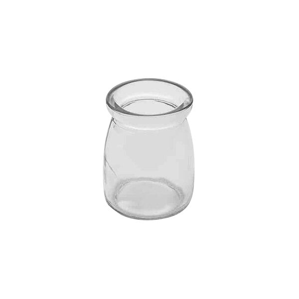 An American Metalcraft clear glass jar with a round top.