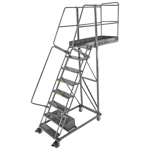 A Ballymore metal rolling cantilever ladder with handrails and metal bars.