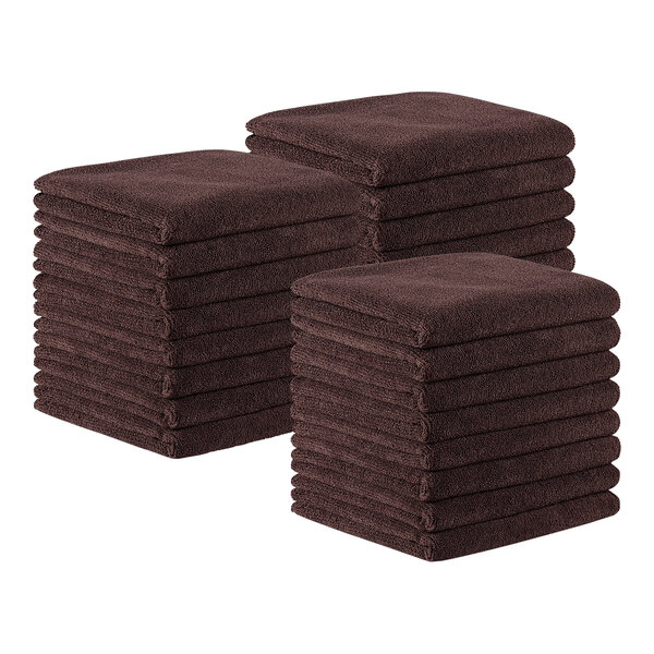 A stack of brown Monarch Brands microfiber hand towels.