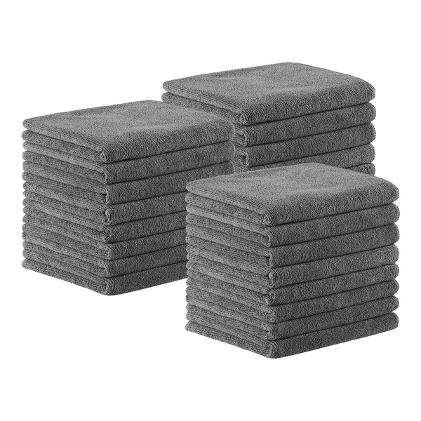 A stack of folded gray Monarch Brands microfiber hand towels.