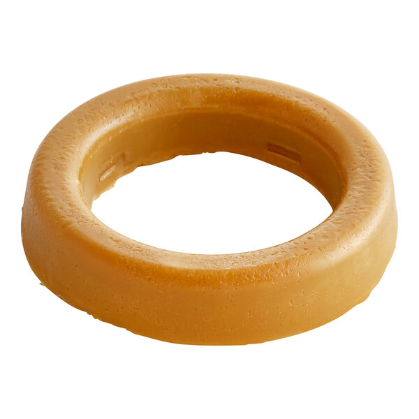 A brown wax ring with a hole in the middle.